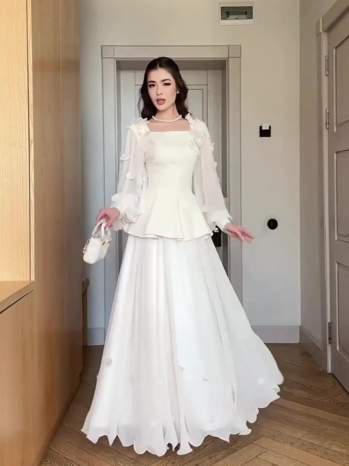 white long-sleeved maxi dress