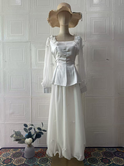 white long-sleeved maxi dress