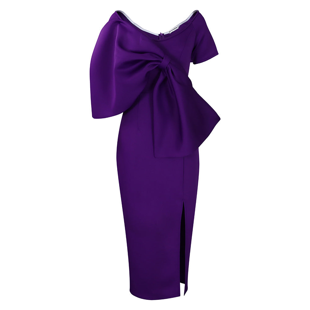 Dress With A Large Bow Slit