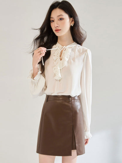 White ruffled tie-waist V-neck puff sleeve shirt