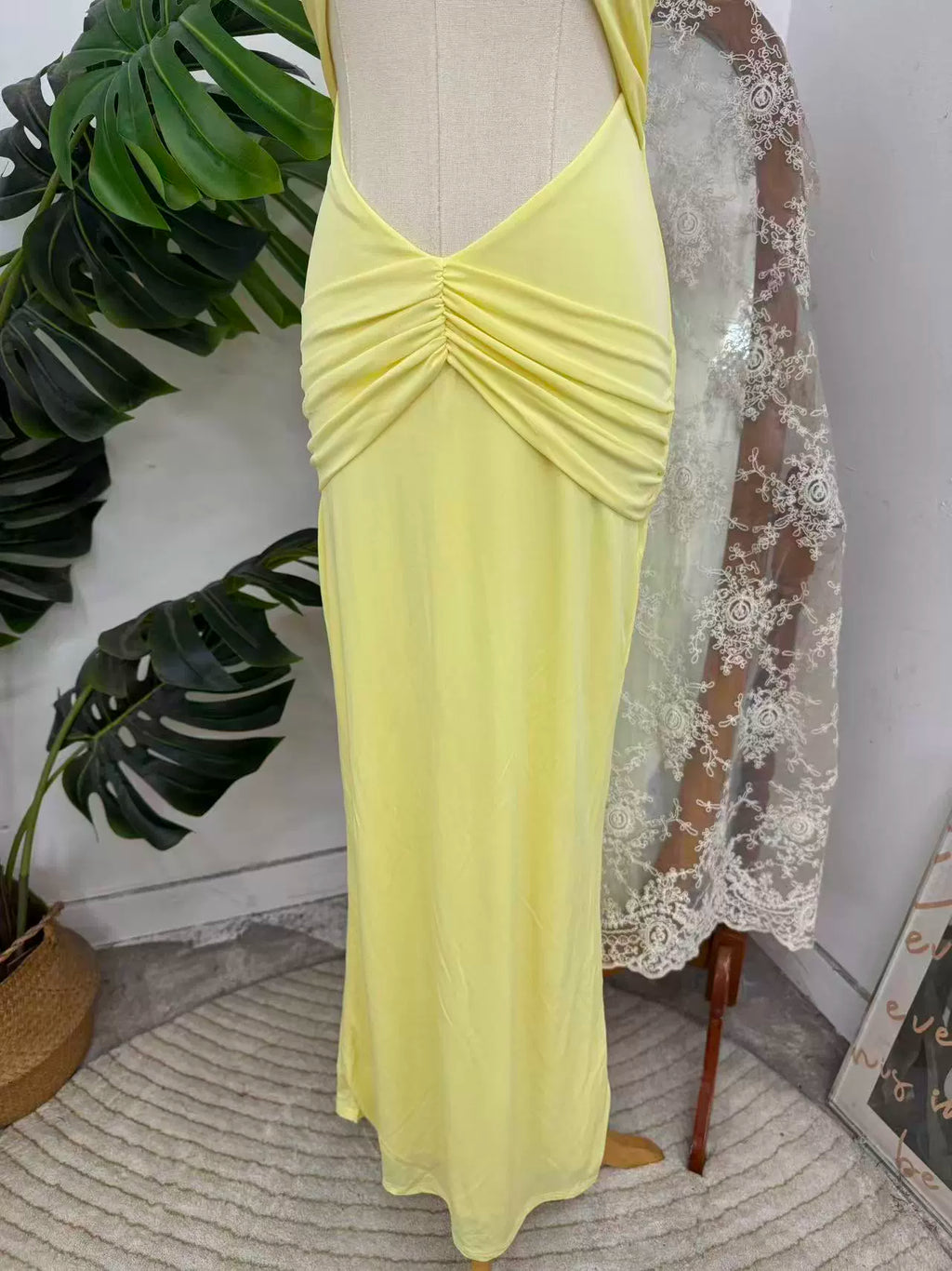 Yellow halter neck long dress with large hollow