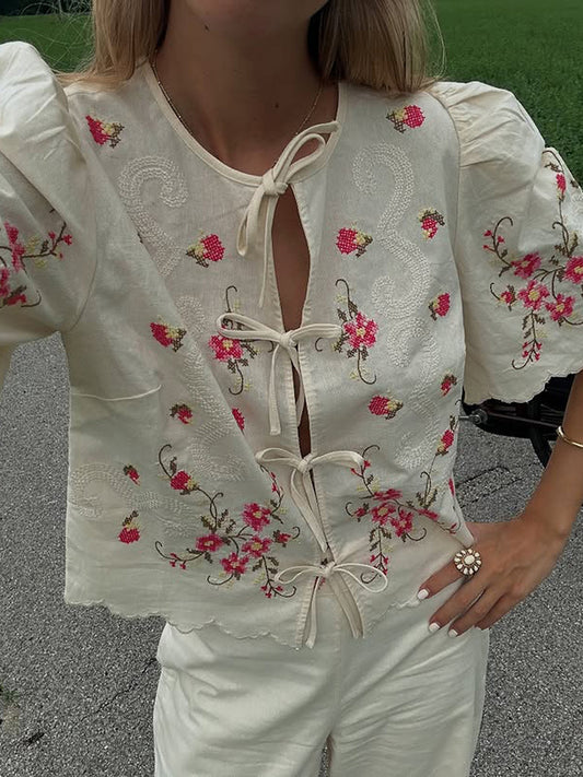 embroidery with flush edge short top