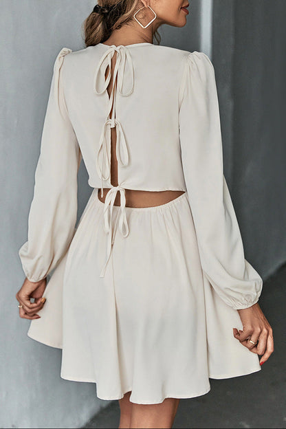 apricot A-line backless long-sleeved dress