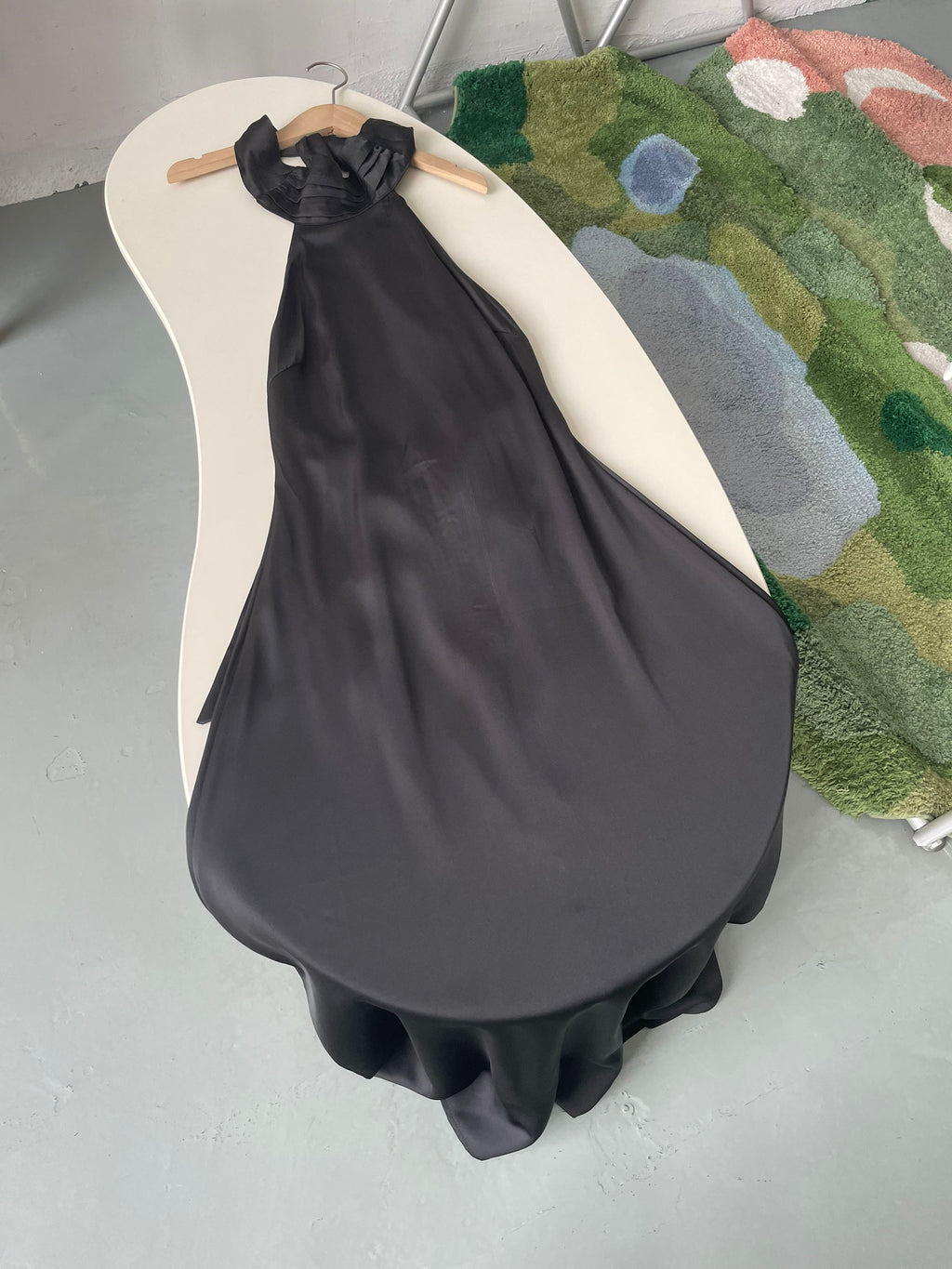 black halterneck off-the-shoulder dress