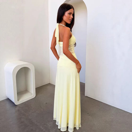 yellow low-cut halterneck dress
