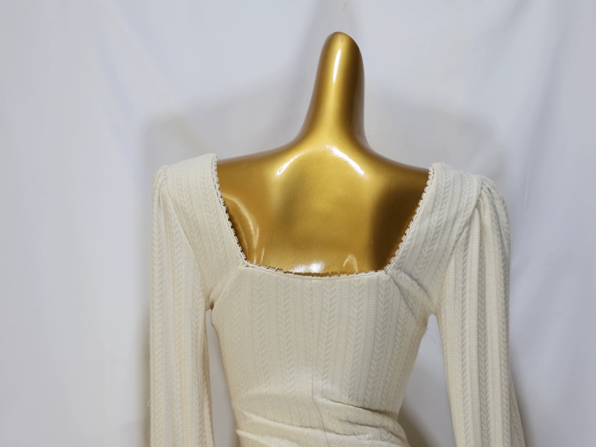 white long-sleeved mini dress