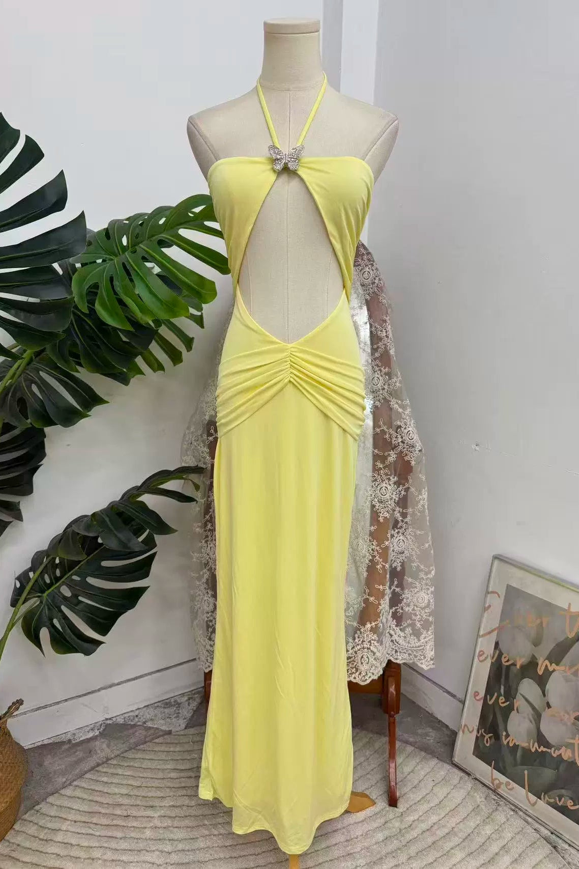 Yellow halter neck long dress with large hollow