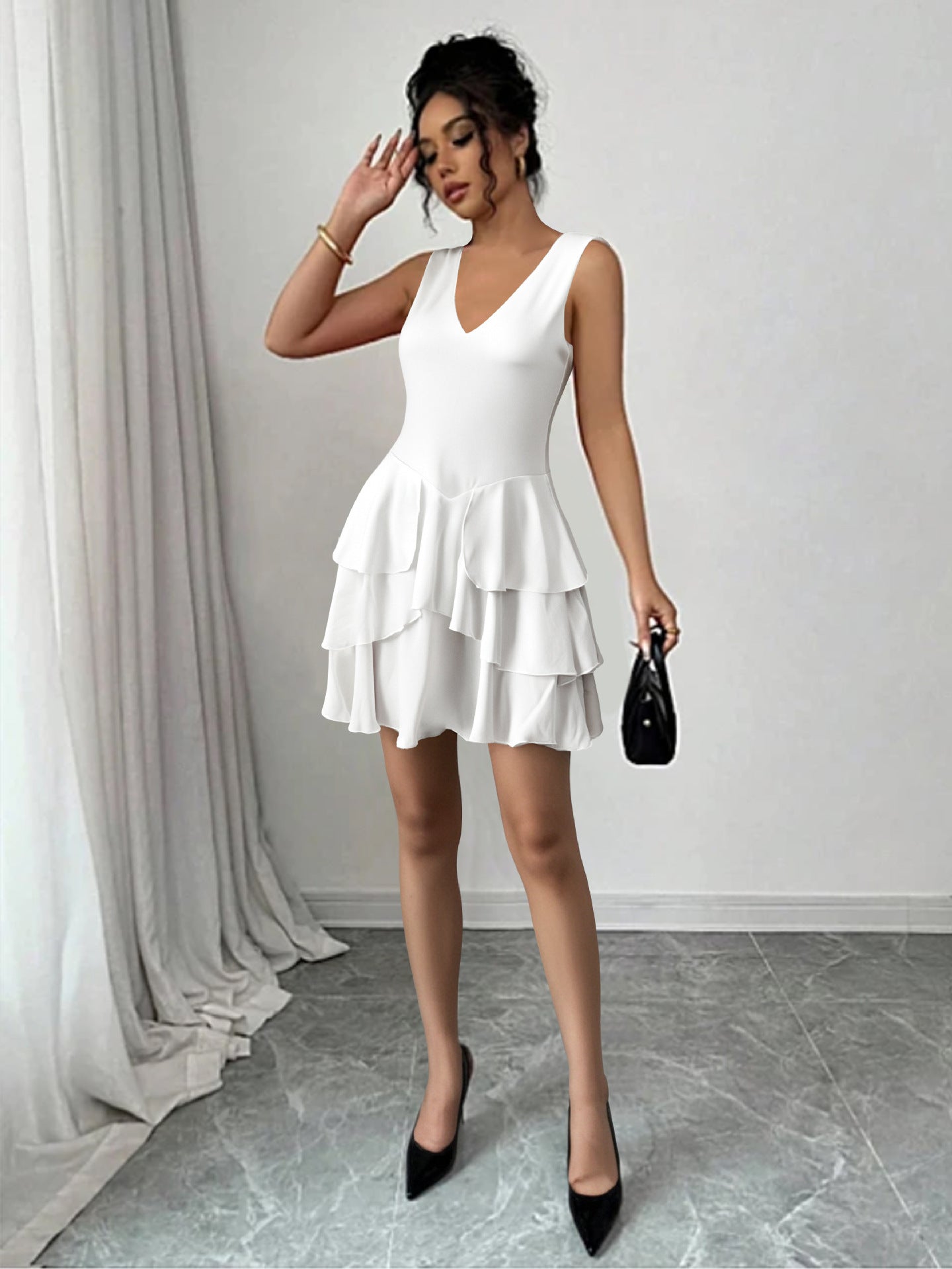 white V-neck low-cut halter top with ruffled hem mini dress