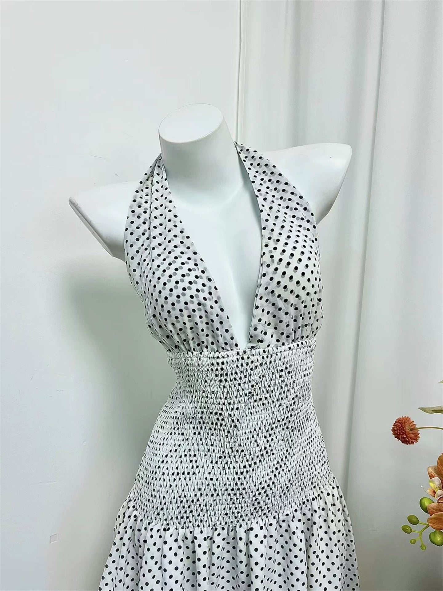 black polka dot halterneck open waist slap dress