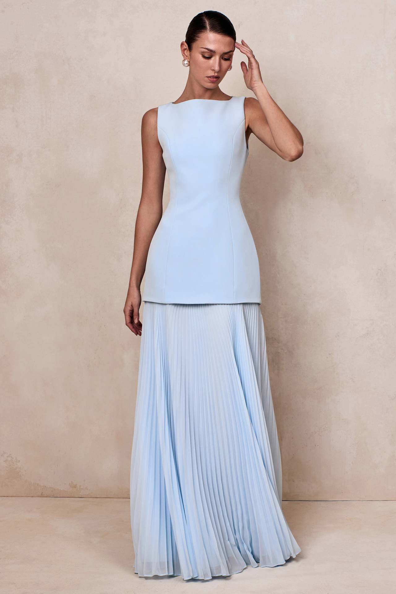 blue pleated sleeveless swing dress