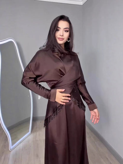 brown long-sleeved maxi dress