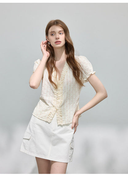 V-neck floral print shirt with ruffled trim and puff sleeves