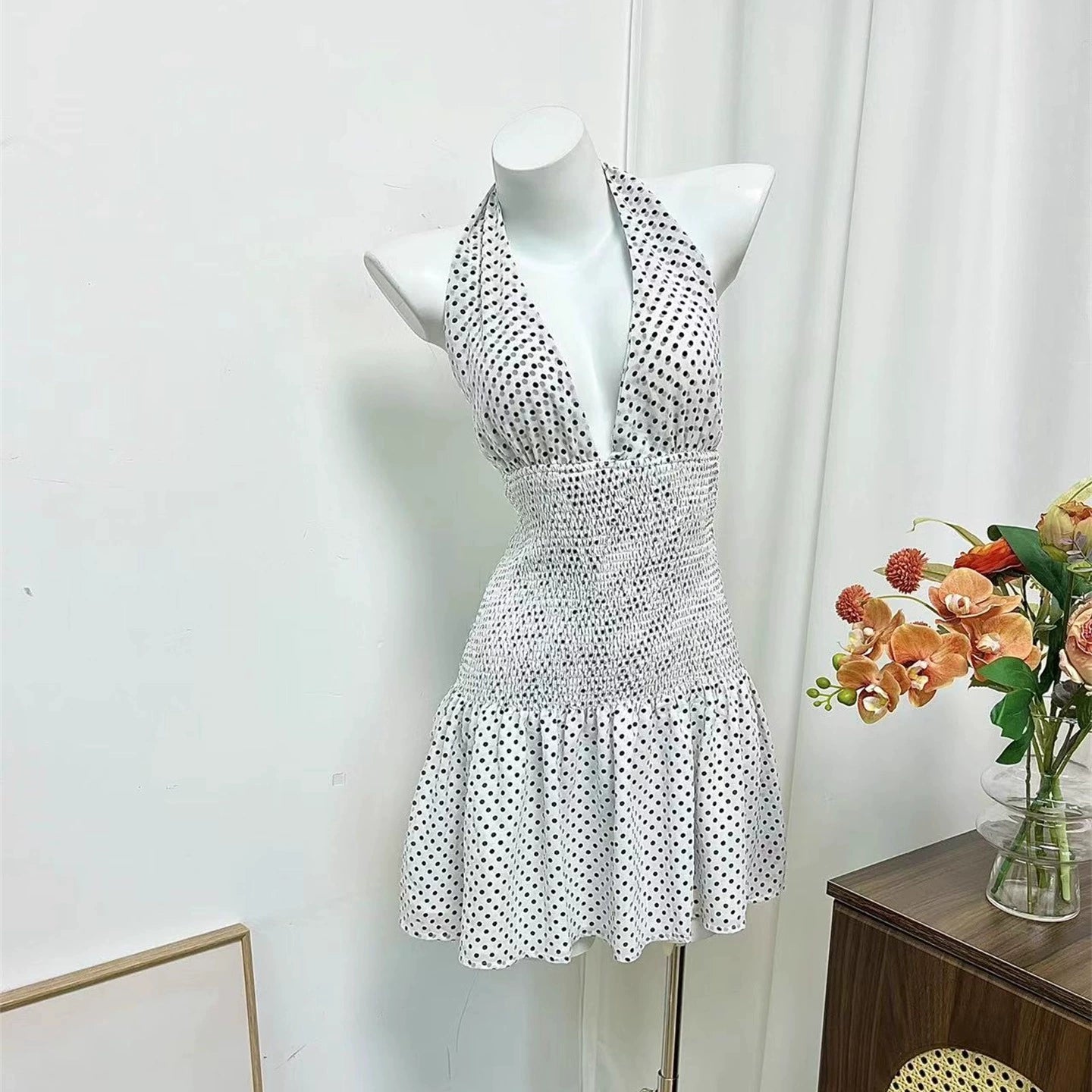 black polka dot halterneck open waist slap dress