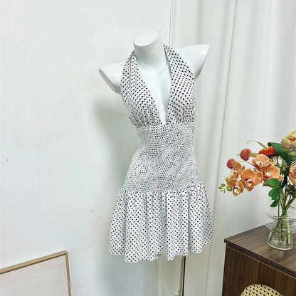 black polka dot halterneck open waist slap dress