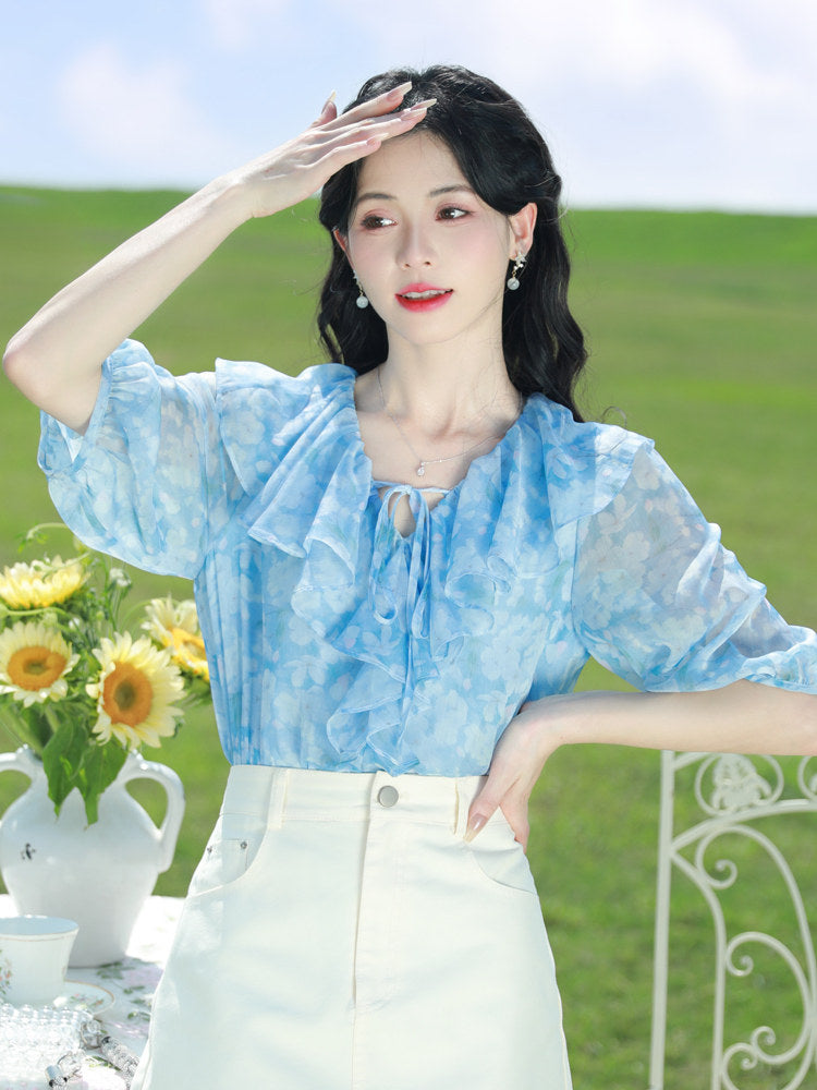 Blue floral chiffon blouse with ruffled V-neck