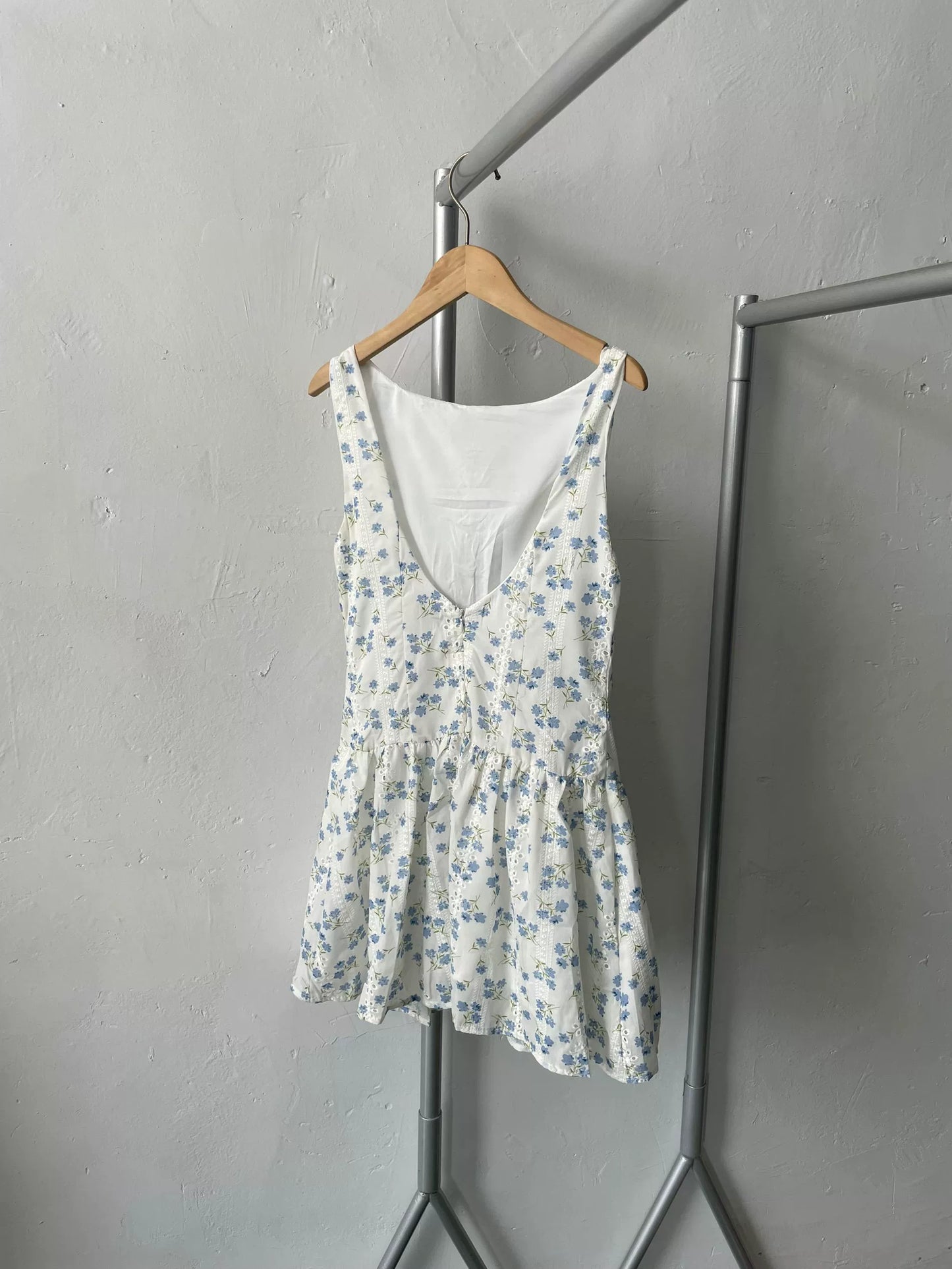 blue low-waisted backless dress