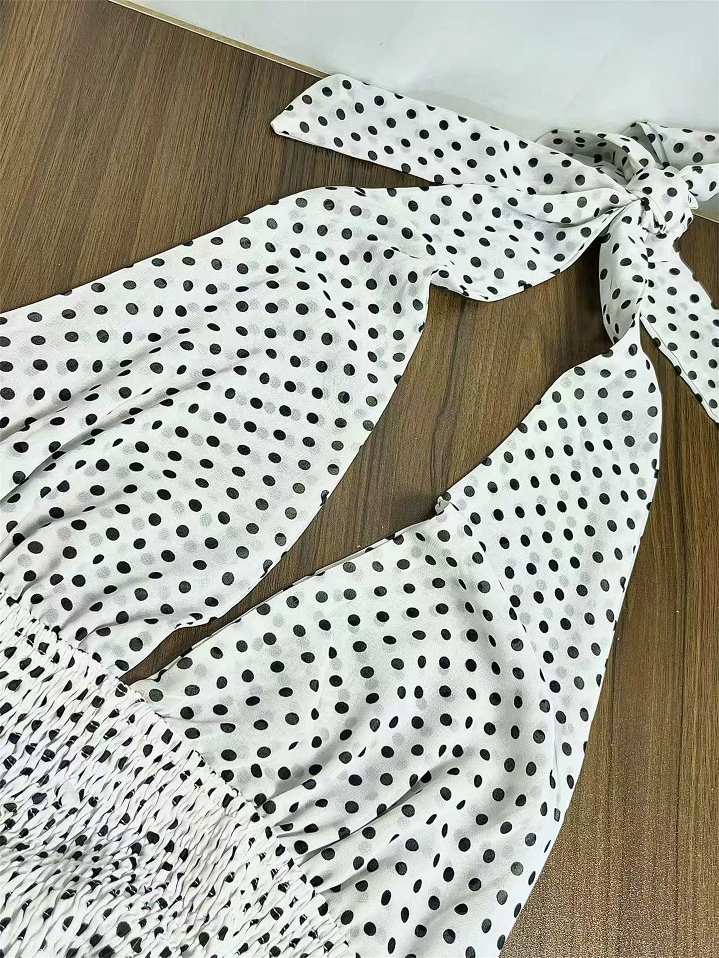 black polka dot halterneck open waist slap dress