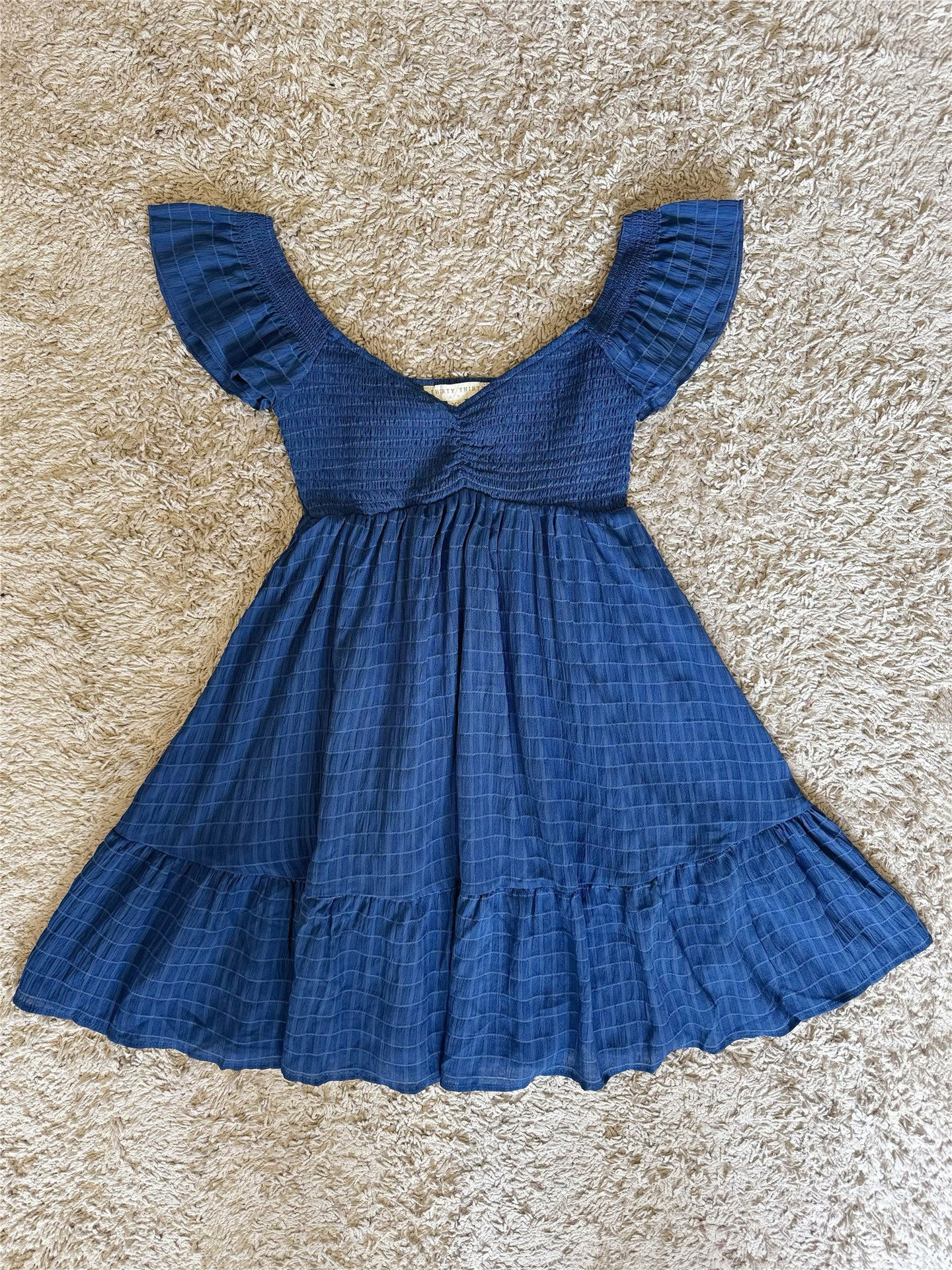 blue sleeveless V-neck mini dress