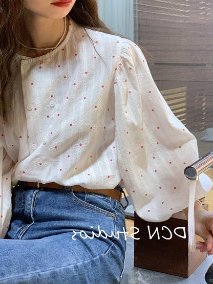 Double-breasted shirt with subtle floral pattern