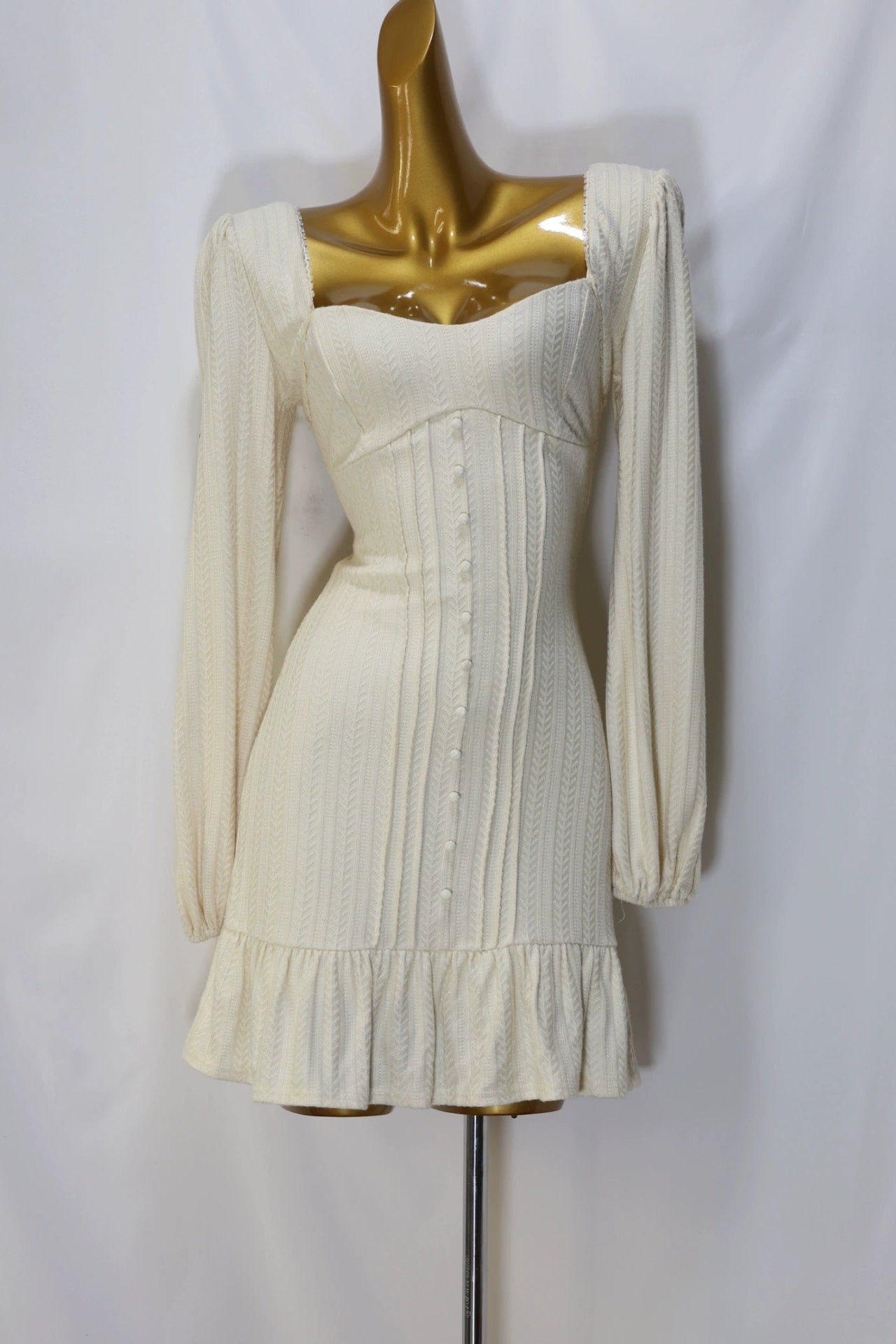 white long-sleeved mini dress