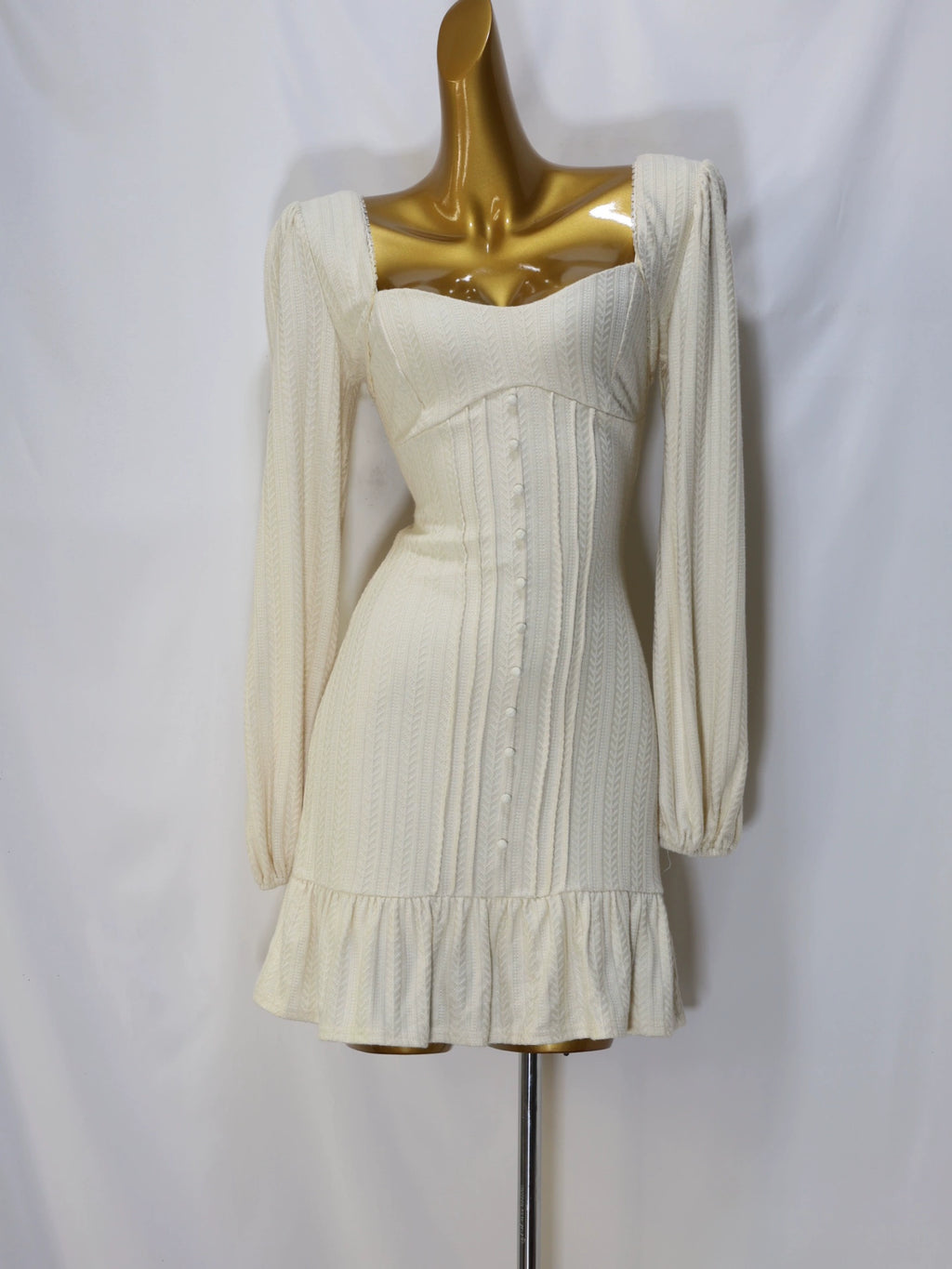 white long-sleeved mini dress