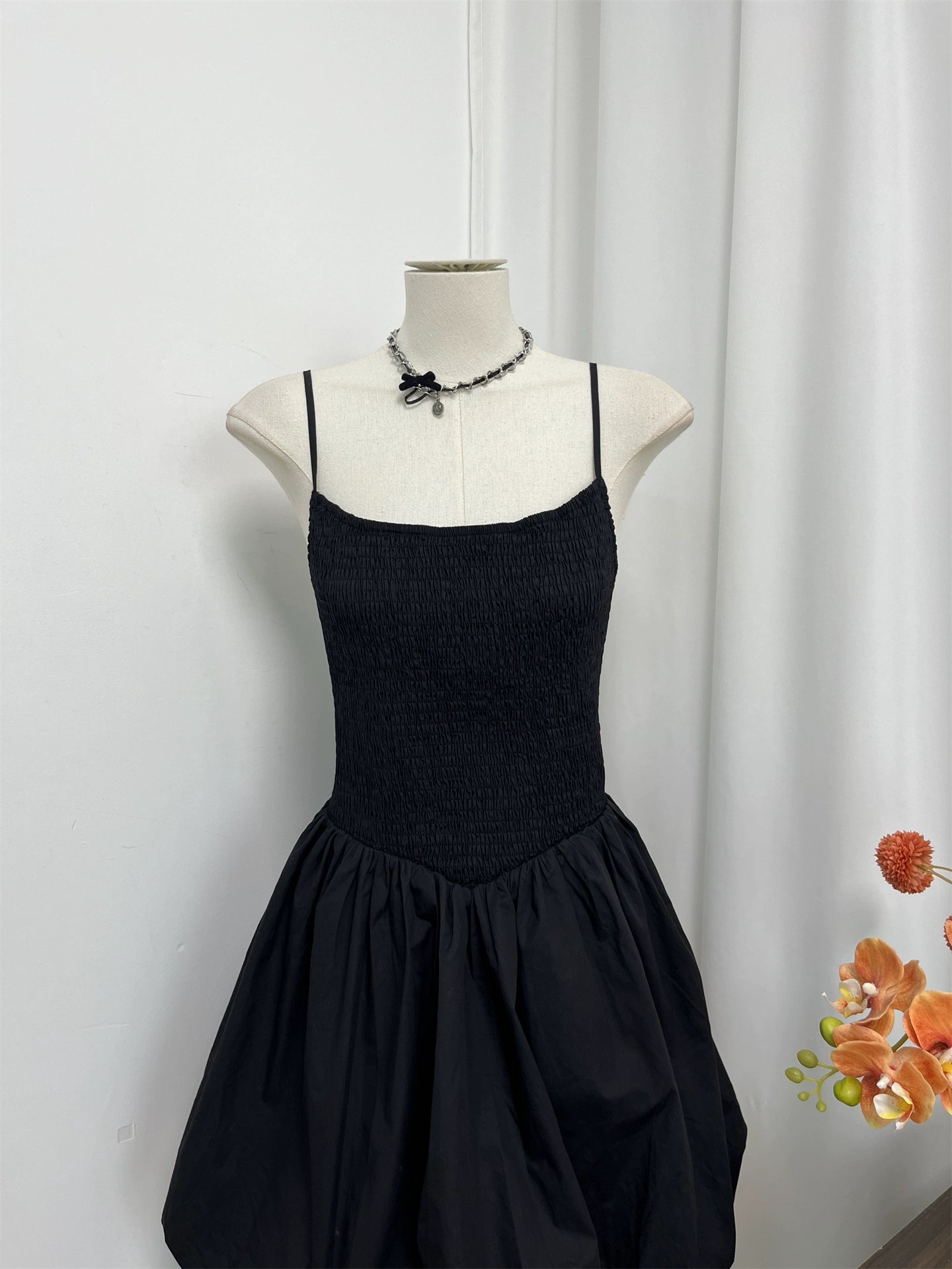 black flower bud mini dress