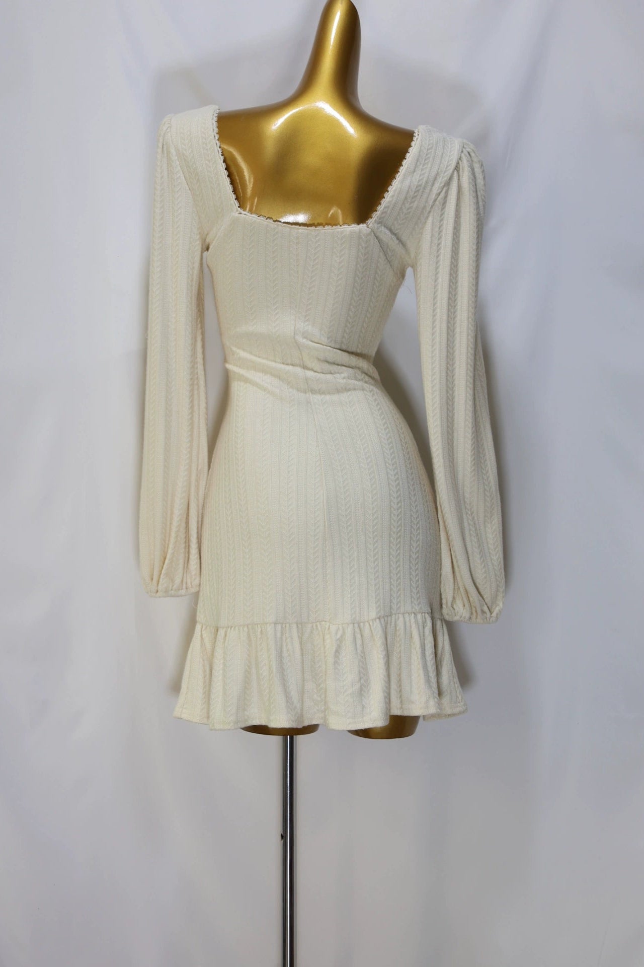 white long-sleeved mini dress