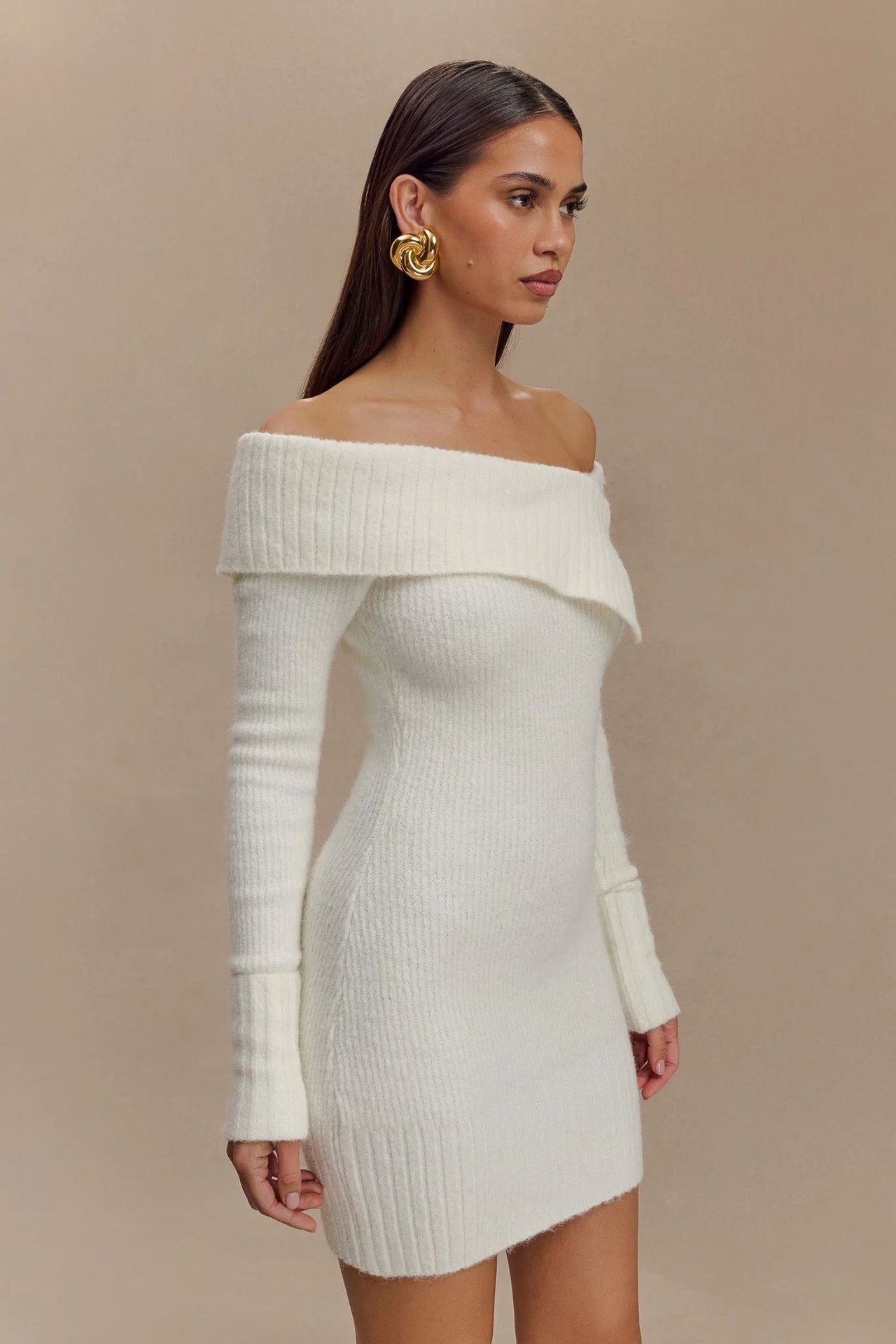 white off-the-shoulder long-sleeved knitted dress