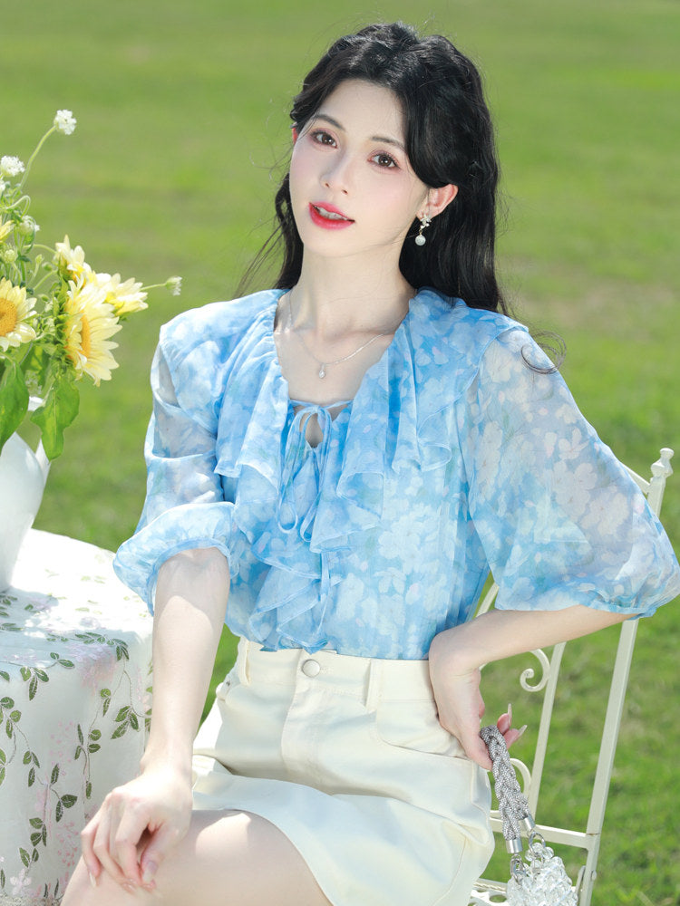 Blue floral chiffon blouse with ruffled V-neck