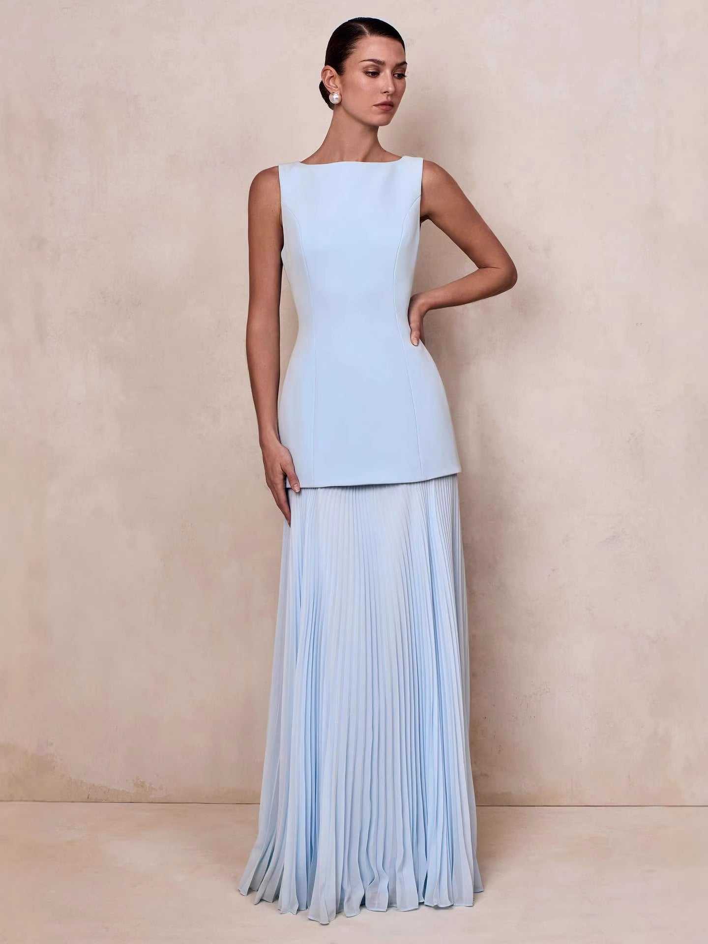 blue pleated sleeveless swing dress