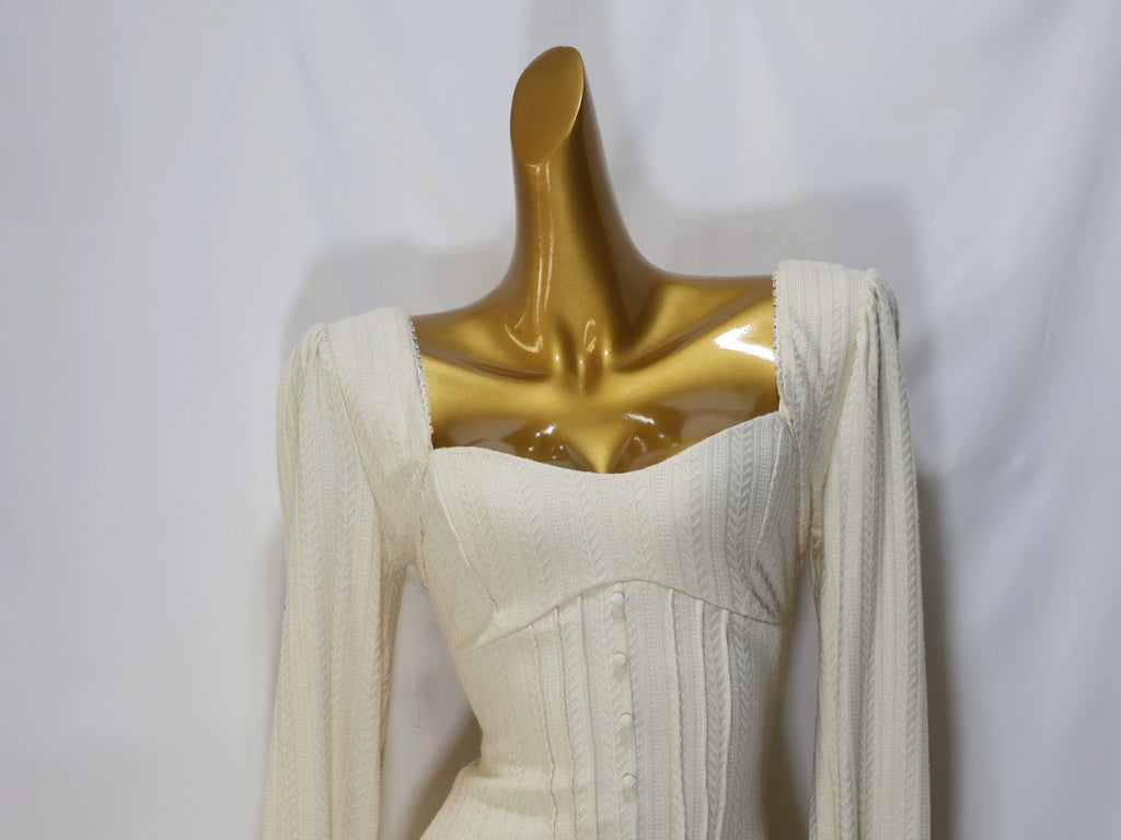 white long-sleeved mini dress