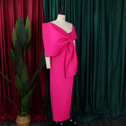 Dress With A Large Bow Slit