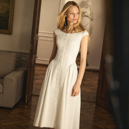 white sleveless button midi dress