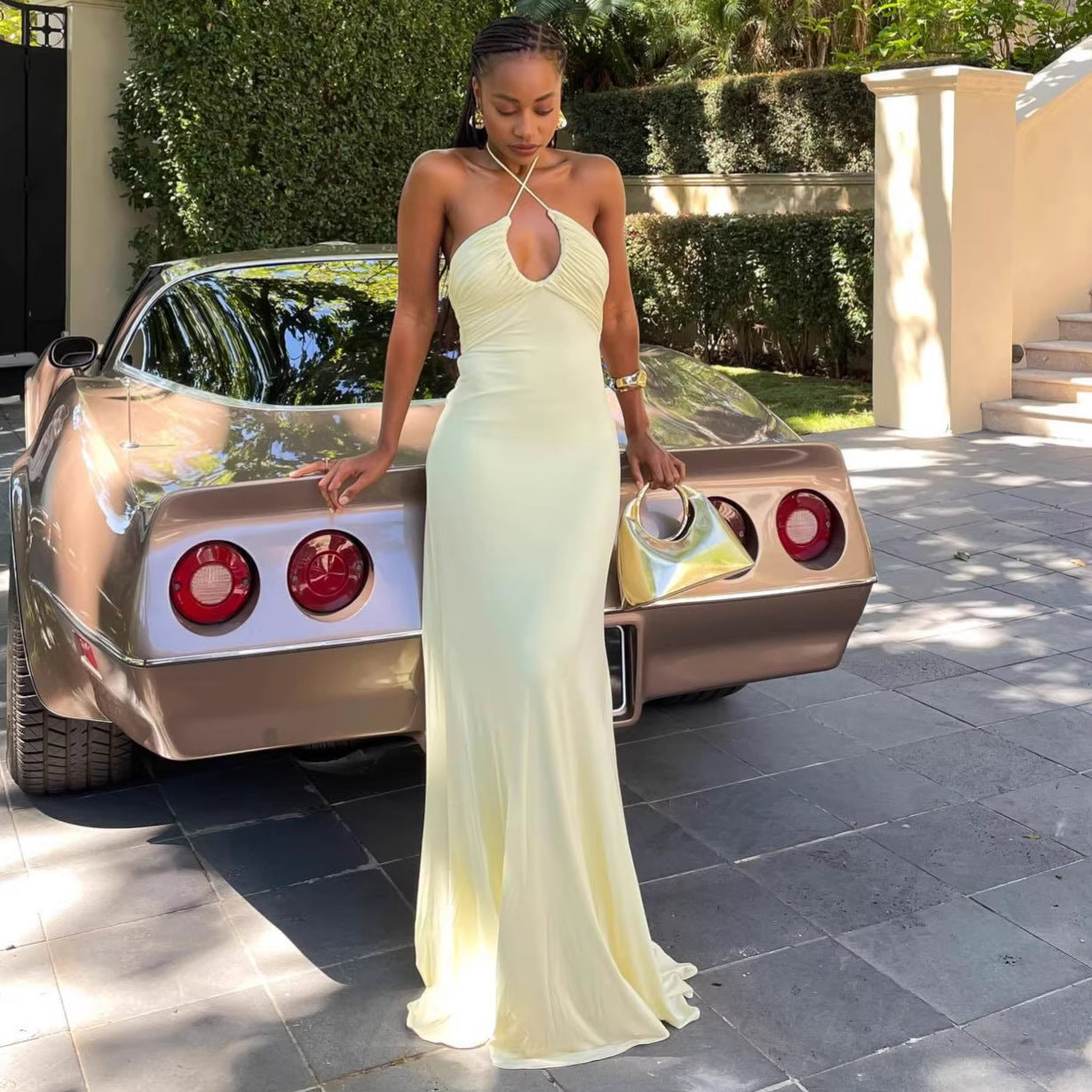 yellow halterneck open back slip dress