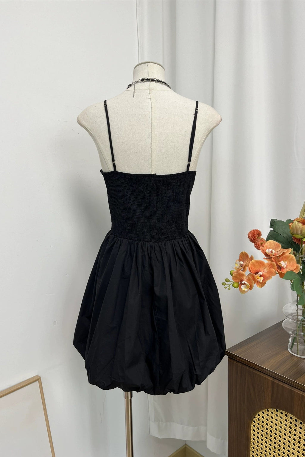 black flower bud mini dress