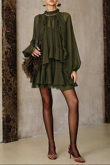 green ruffled tail mini dress