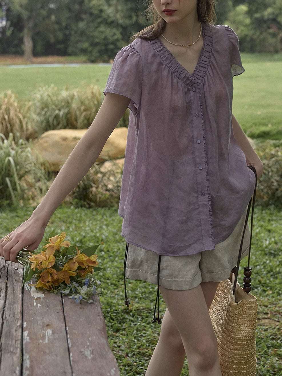 purple short-sleeve V-neck shirt