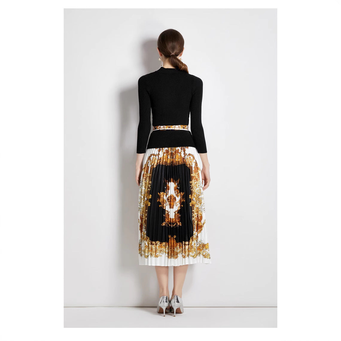 Two-piece knit top and printed pleated skirt set