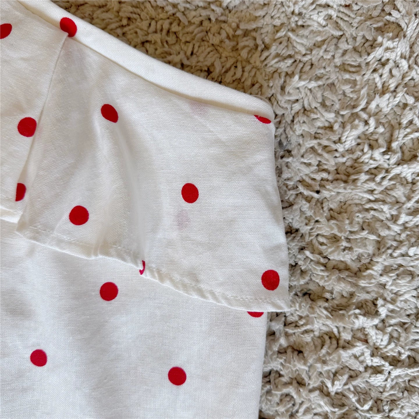 polka dot ruffle one-sided off-the-shoulder linen top