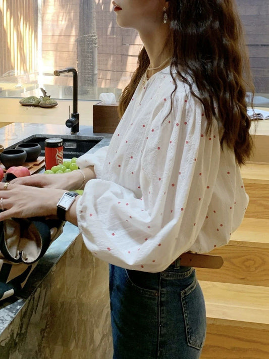 Double-breasted shirt with subtle floral pattern