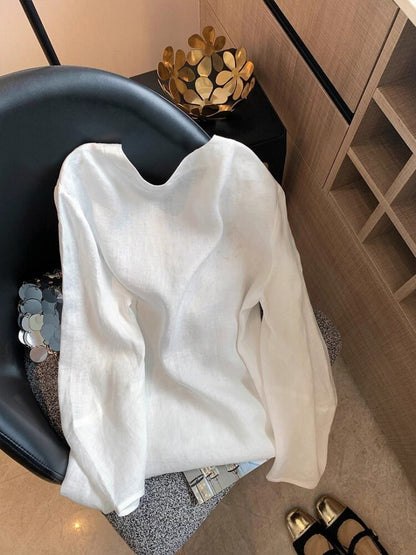 white linen long-sleeve hollow-out embroidered V-neck top