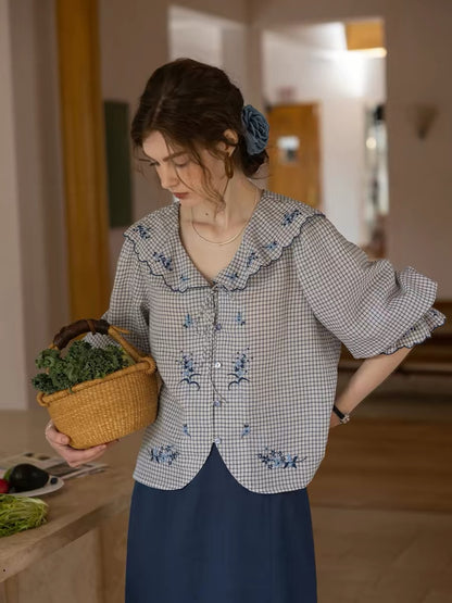 Blue floral embroidery lotus leaf collar lace-up shirt