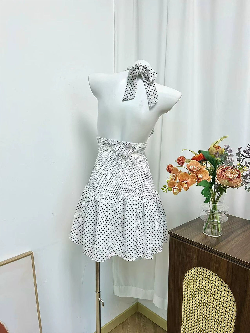 black polka dot halterneck open waist slap dress