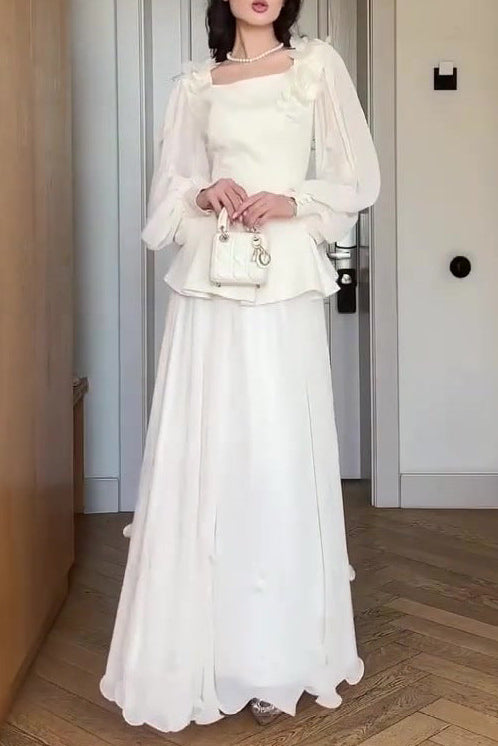 white long-sleeved maxi dress