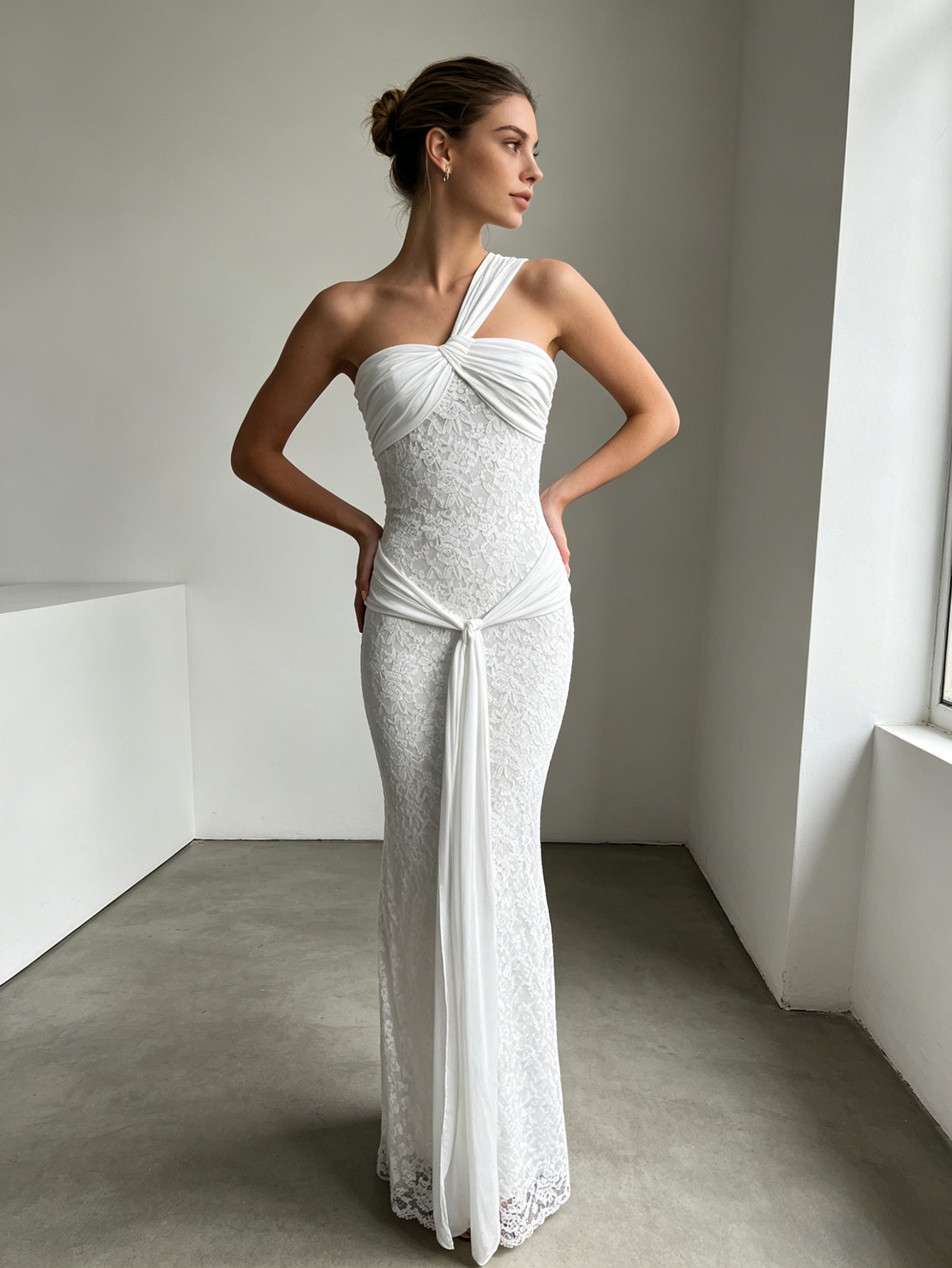 white slanted shoulder strap lace dress