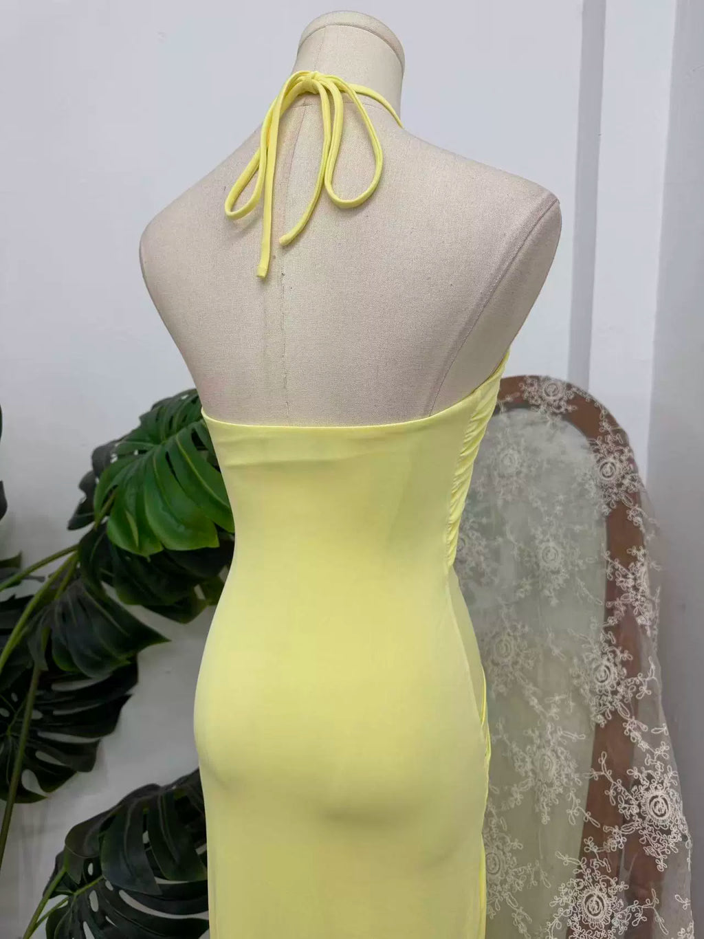 Yellow halter neck long dress with large hollow